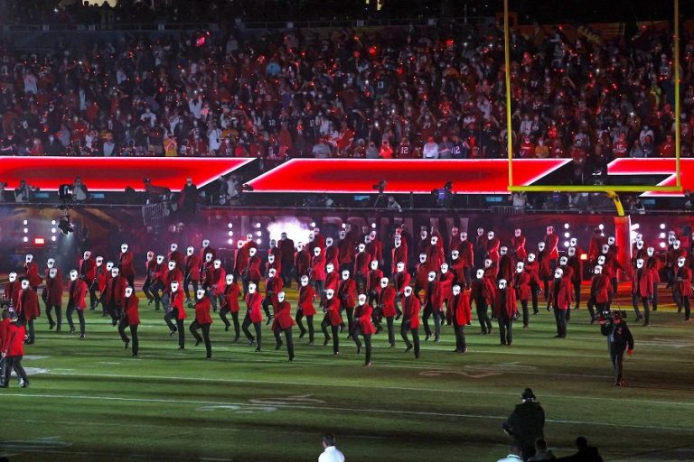 Watch: The Weeknd brings bright lights, bandaged dancers to Super Bowl show