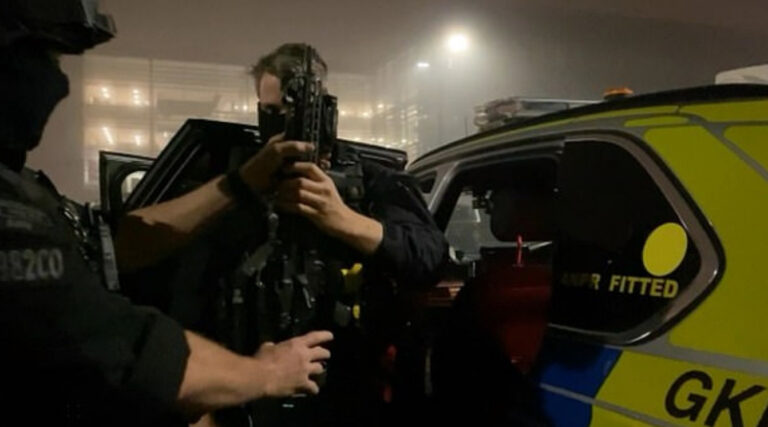 Armed cops smash ‘rent-a-gun’ gang as 350 officers swoop in dawn raids across London, Essex and Kent