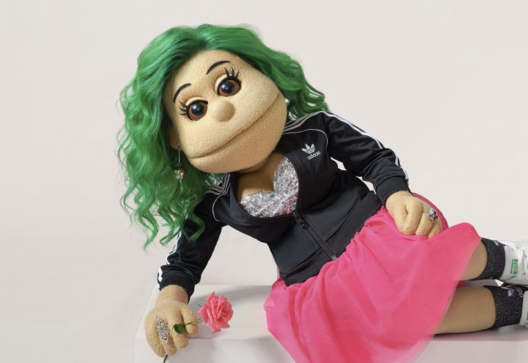 Egyptian puppet Abla Fahita poses for sportswear giant Adidas 