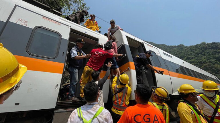 Taiwan train crash horror leaves 36 dead and dozens trapped as service smashes into truck which fell…