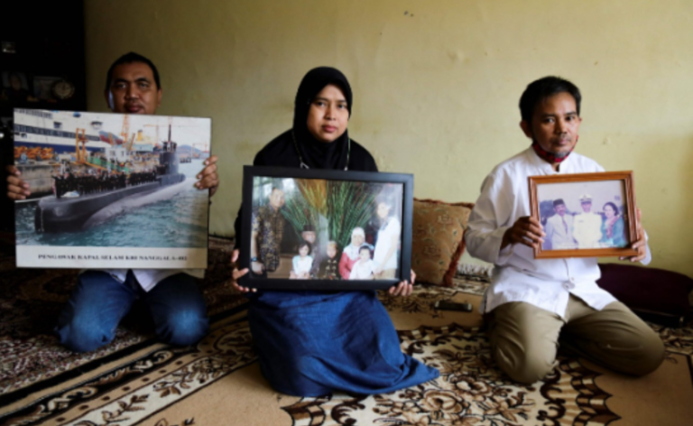 Debris from missing Indonesian submarine with 53 crew found after three-day search