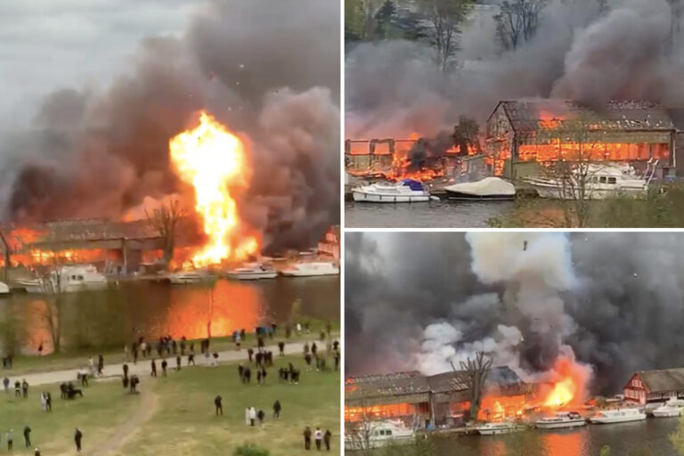 Explosions heard as 100 firefighters tackle huge blaze at historic boat house on Thames island near…