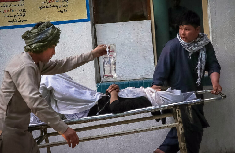 At least 40 killed including children after bomb blast near Afghan school as desperate families…