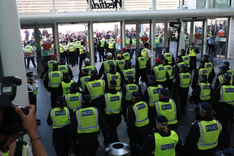 Anti-vaxxers claiming pandemic is a hoax try to storm Westfield shopping centre and clash with cops