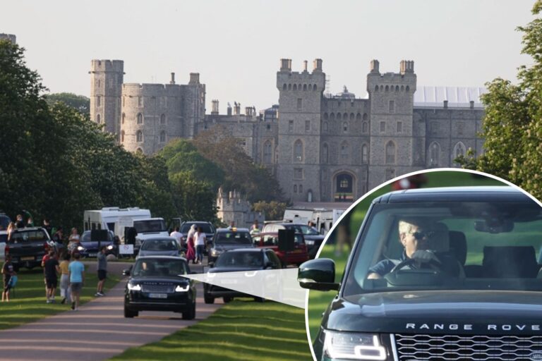 Prince Andrew drives past travellers who set up caravan camp outside Windsor