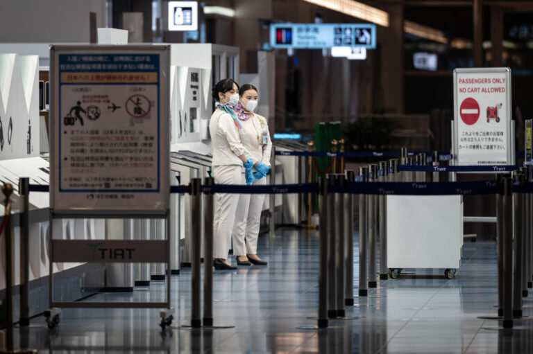 Japan retracts new flight bookings ban after criticisms