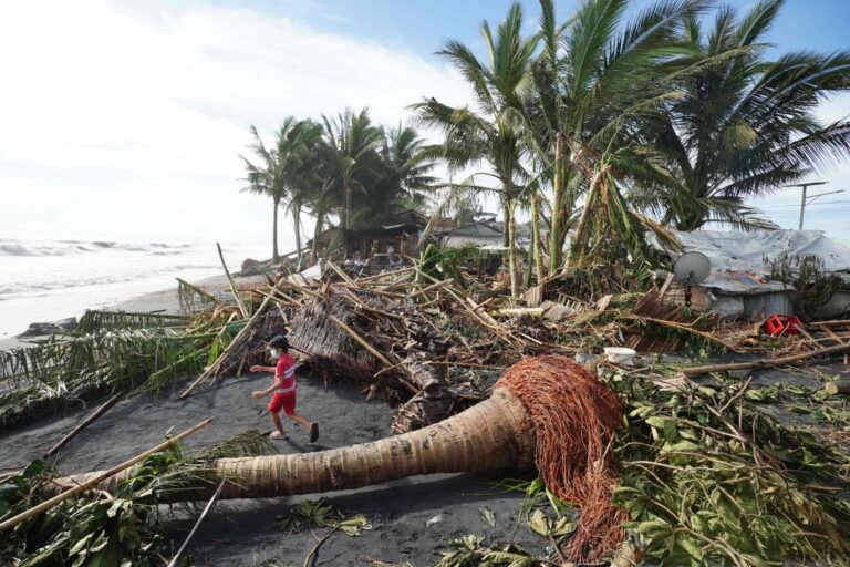 At least 3 dead as strong typhoon pummels Philippines