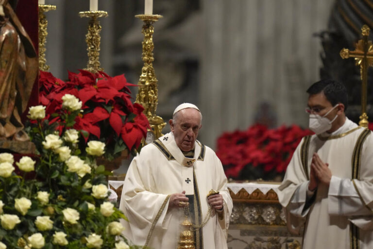 Pope celebrates Christmas Eve Mass as virus surges in Italy