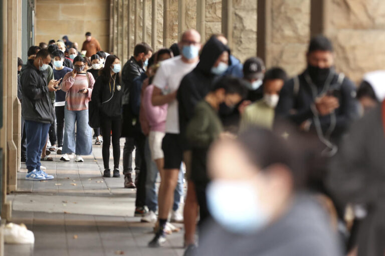 Australia COVID-19 numbers hit a peak as omicron outbreak strains domestic politics