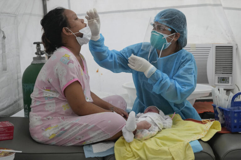 Philippines to tighten coronavirus curbs after domestic omicron detection