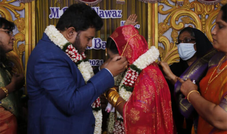 Indian taxi driver’s ‘dress bank’ saves poor brides from financial ruin