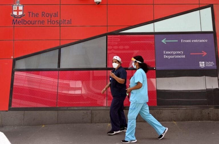 Some coronavirus restrictions back in Australia as omicron surges