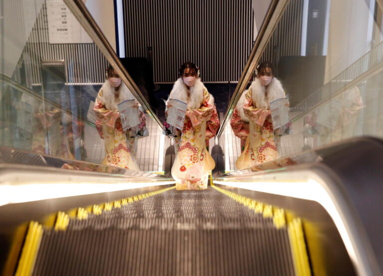 Japan extends strict border measures as coronavirus cases soar