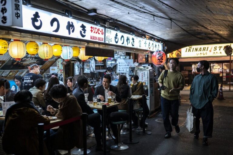 Japan ready to expand COVID-19 restrictions as infections surge