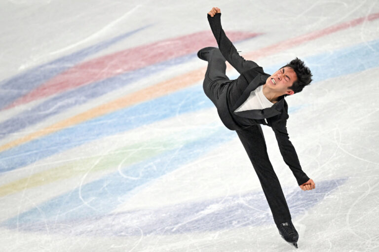 Chen flips, spins way to world-record score at Olympics