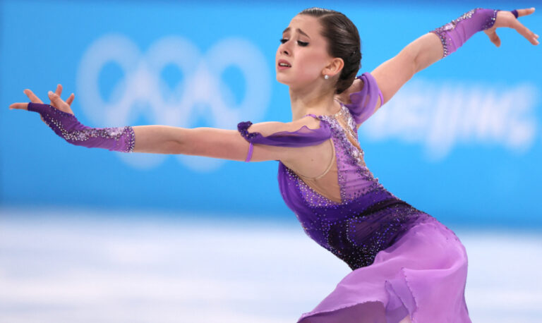 Emotional Valieva takes lead in Olympic figure skating