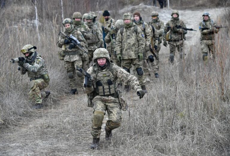 Ukraine officials shelled on eastern front as separatists go on full military mobilization
