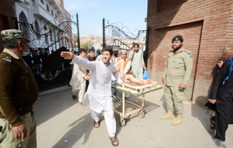 At least 50 killed, scores wounded in blast at mosque in northwest Pakistan