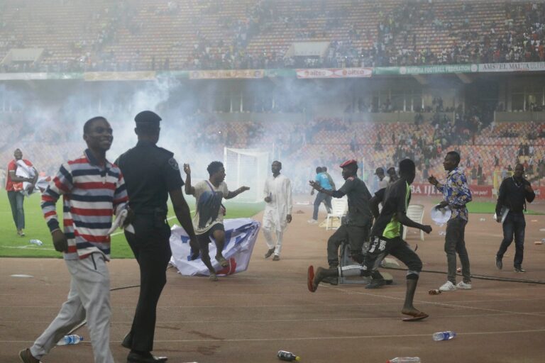 Tear gas fired as Nigeria fans riot over World Cup loss