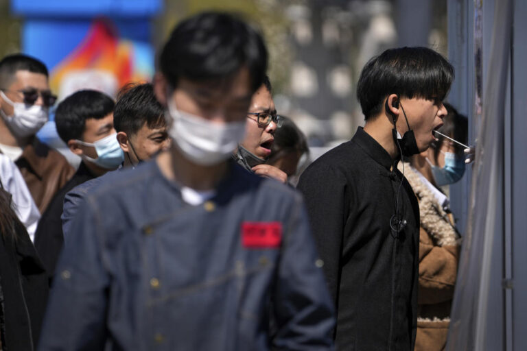 COVID-19 cases rise in Shanghai with millions under lockdown