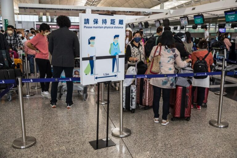 Hong Kong leader defends COVID-19 flight ban policy