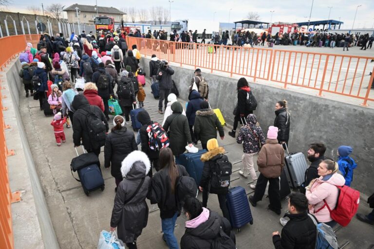 Civilians try to flee east Ukraine as Russia prepares attack