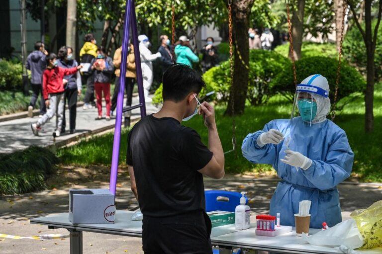 Shanghai widens COVID-19 testing as other Chinese cities impose curbs