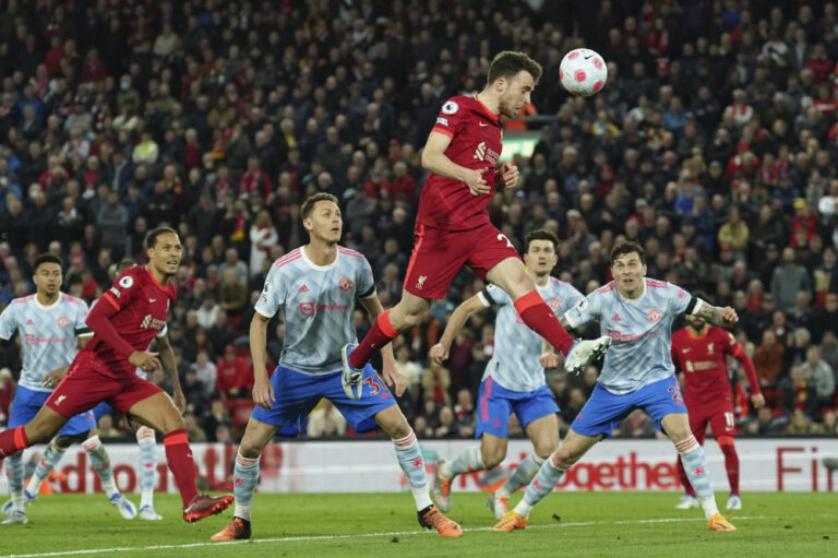Liverpool thrash miserable Man Utd to go top of Premier League