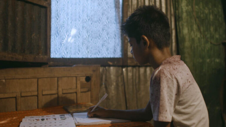 In Dhaka’s largest slum, residents seek relief from mosquitoes with zebra stripes