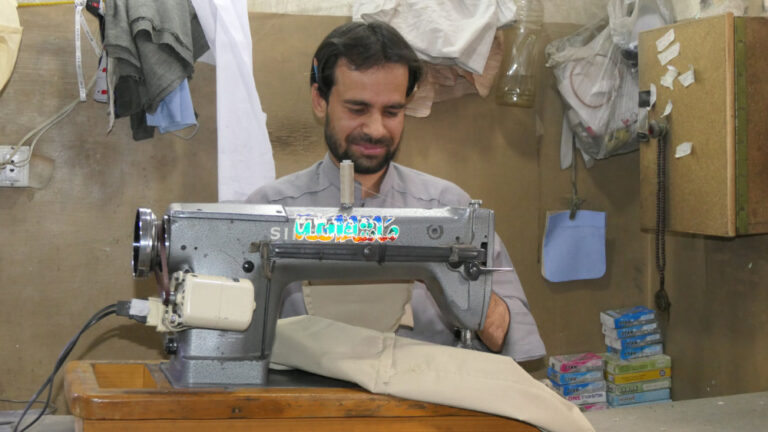Pakistani with hearing impairment tailors the way for workers with disabilities