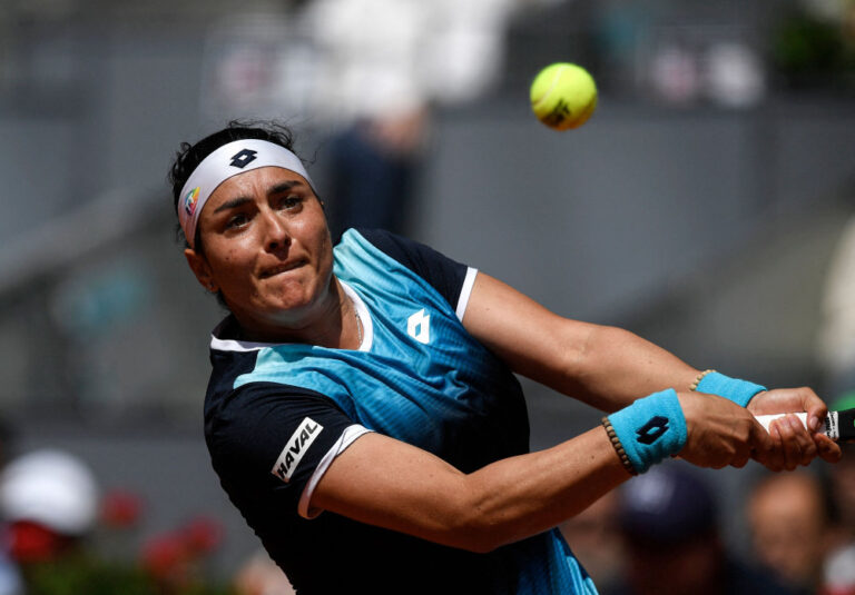 Nadal returns from injury with straight-set win in Madrid