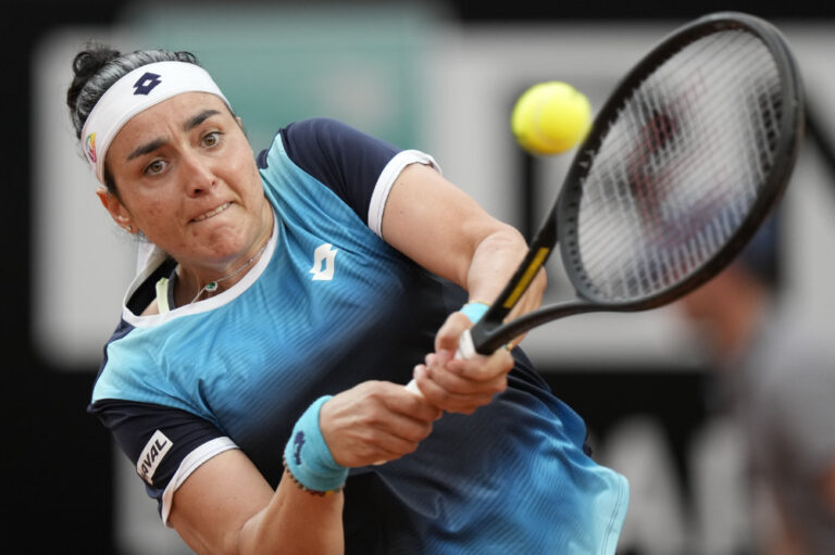 Djokovic, Jabeur progress in Rome but back injury stops Raducanu