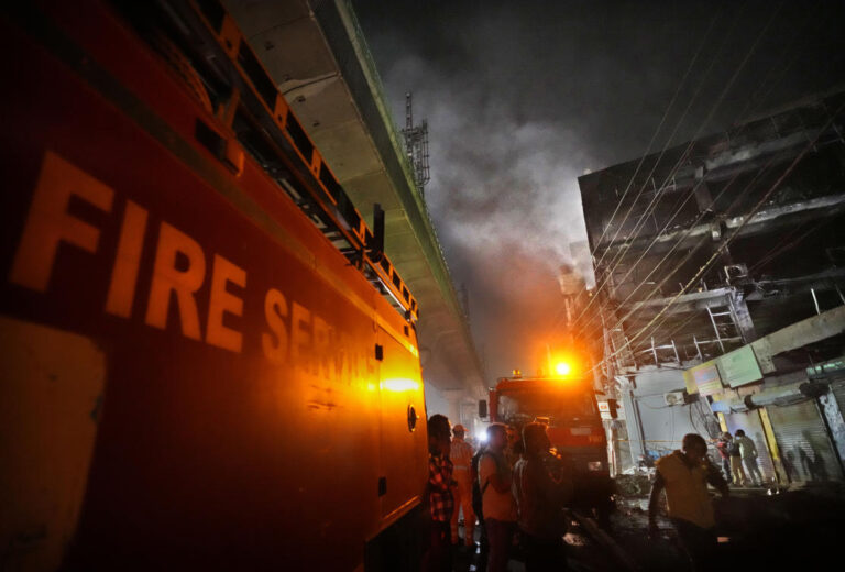 Police arrest 2 after building fire kills 27 in New Delhi