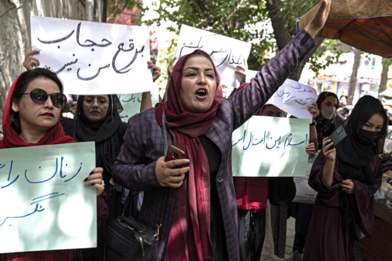 Afghan women TV presenters cover faces on air