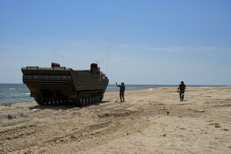 Russia destroys bridge over Ukrainian river, cutting escape route