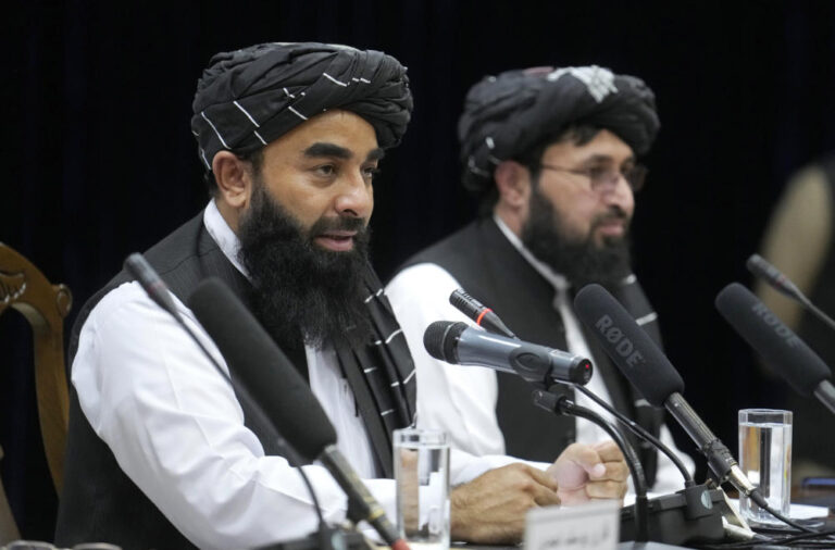 Taliban chief pardons members of former administration in rare public appearance