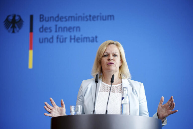 Germany eases path to permanent residency for migrants