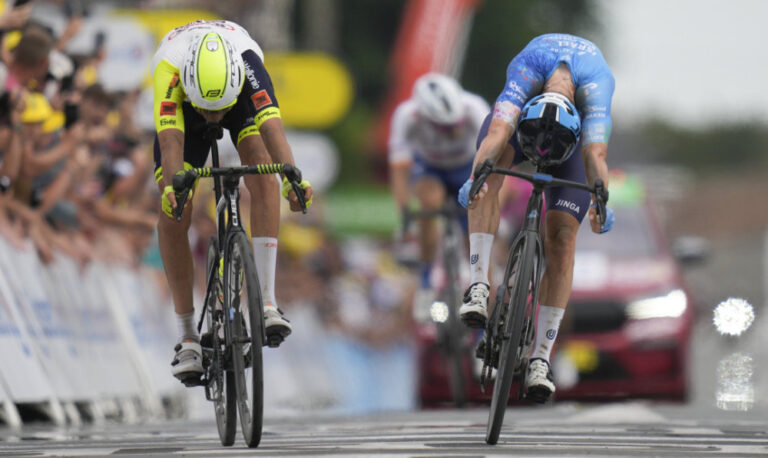 Cobble king Clarke rules Tour de France stage five with bike throw