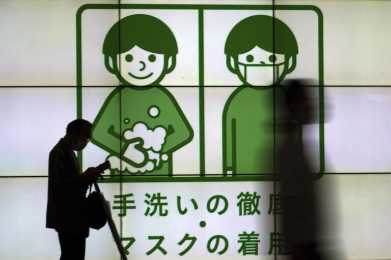 Fresh COVID-19 wave sweeps Asia, New Zealand warns of pressure on hospitals