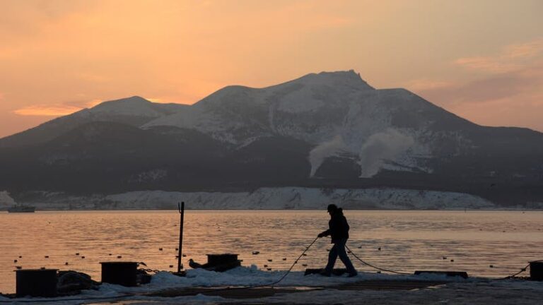 Japan urges Russia not to hold military drills around disputed islands