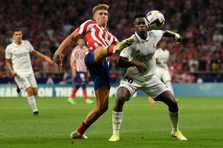 Real Madrid triumph at rivals Atletico in spiky derby