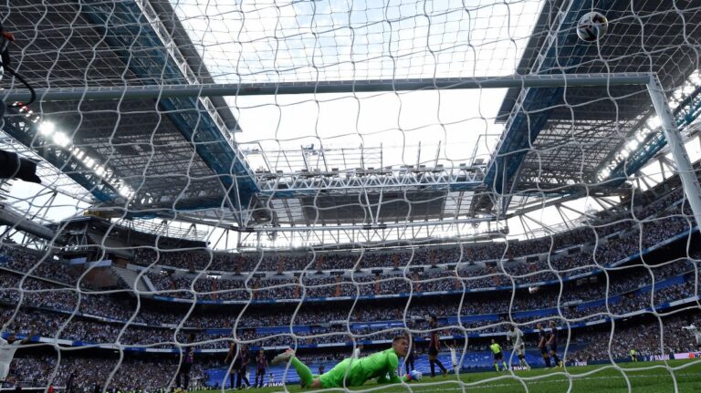 Unbeaten Madrid defeat Barcelona in Clasico to top La Liga