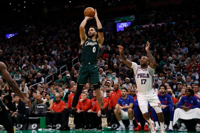 Tatum, Brown shine as Celtics down Sixers in season opener