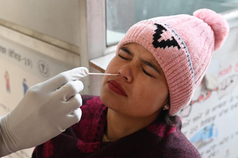 India to drop pre-departure COVID-19 tests for travelers from China, other countries