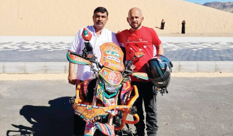 Pakistani adventurer paints bike with truck art to project country’s soft image in Middle East