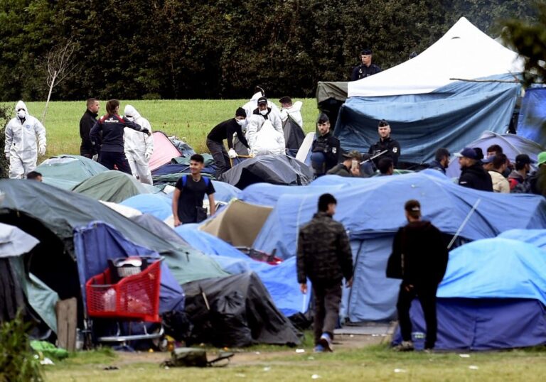 Man shot in French migrant camp believed to be Kurdish smuggler