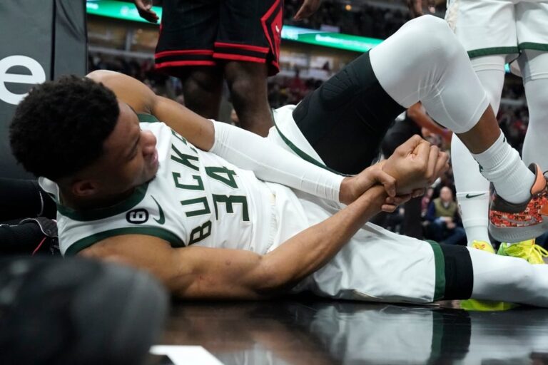 Antetokounmpo injury scare as Bucks roll to 12th straight victory