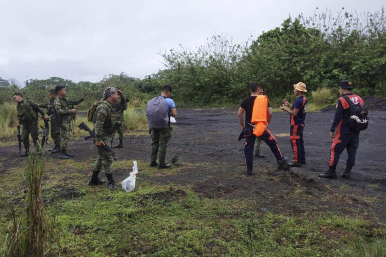 High-risk volcano search for Philippine plane with 4 aboard