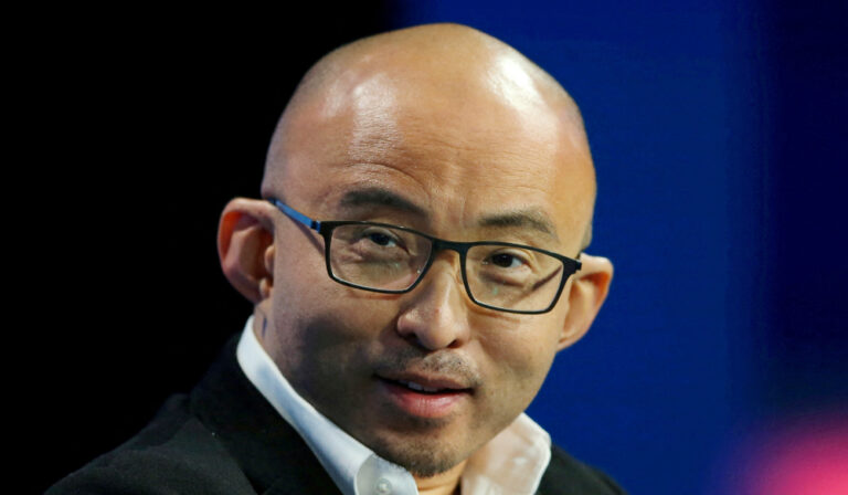 Chinese bank says missing chairman is cooperating with Chinese authorities in an investigation