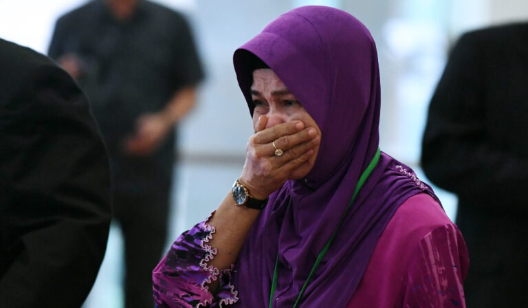 Nine years on, families urge new search for missing Malaysia plane MH370